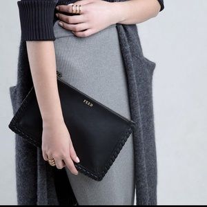 New with tags  FEED Projects- Braided Leather Clutch